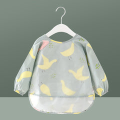 Children In Waterproof Overalls Wear Bibs For Eating